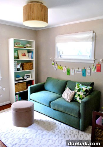 Guest Room Space With Bookcase And Bright Green Couch