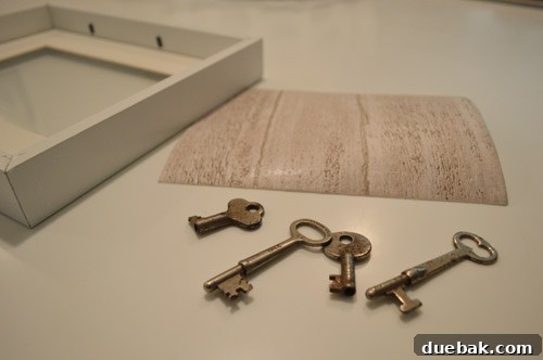 Wood-grain paper cut to size, ready to be placed in a picture frame.
