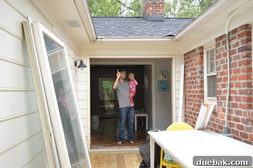During the installation process, old sliding doors removed, new French door frame being fitted.