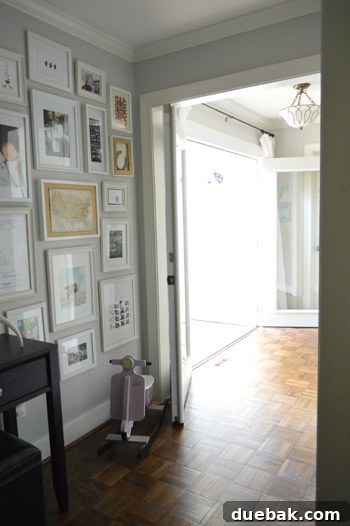 French doors fully open, demonstrating ample clearance in the adjacent hallway, showing functional design.