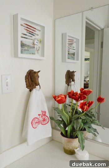 Preserving Memories in Shadow Box Frames 10 Finished shadowbox hanging on a bathroom wall