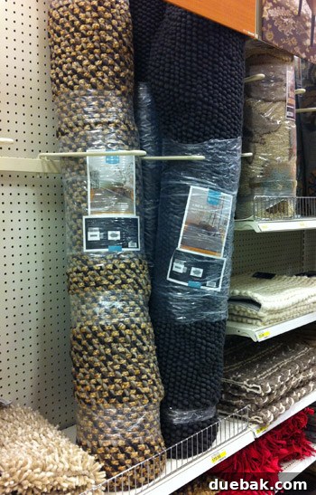 Textured neutral area rugs in various shades, offering subtle and sophisticated home decor