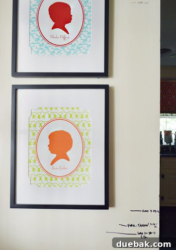 Kitchen wall with a family growth chart and bright silhouettes of the children, adding personalized family touches