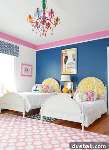 Farmhouse Drifters A Happy Country Home 11 Twin Bed Side-By-Side In Blue Room With Pink Border And Colorful Crystal Chandelier
