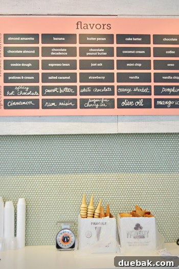 Gelati Celesti: The Store Overload Phenomenon 5 Closer look at the salmon-colored sign and mint green penny tile