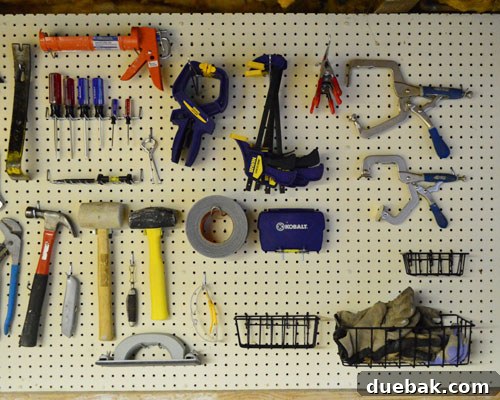 Maximize Tool Storage with a Pegboard 11 Pegboard with various tools including power tools