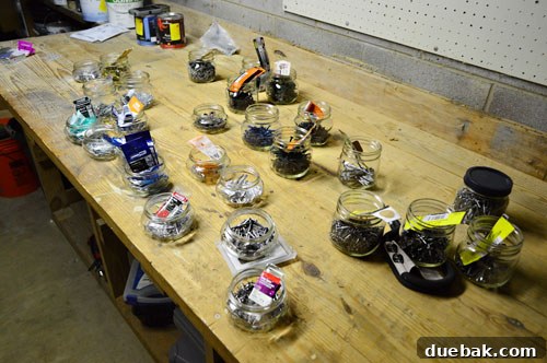 Maximize Tool Storage with a Pegboard 16 Mason jars with temporary labels