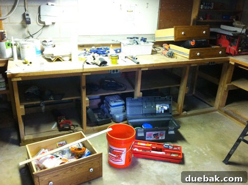 Maximize Tool Storage with a Pegboard 3 Tools piled on basement floor