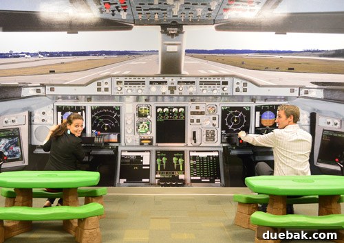 Authors in airport play area