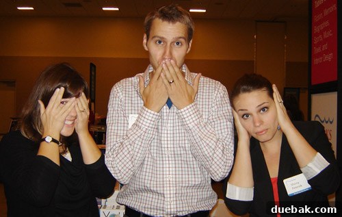 Authors posing with a fan