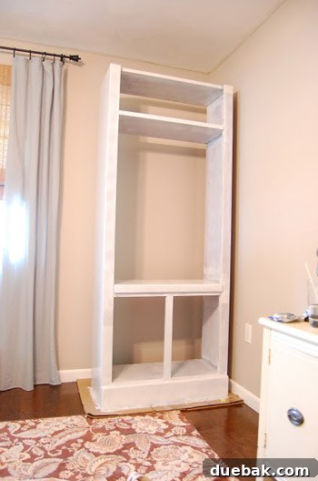 The bookcases after being painted in Benjamin Moore White Dove, looking refreshed