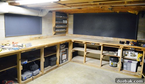 Both pegboards after two coats of Hale Navy paint