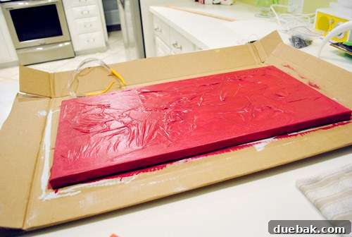 A DIY project that was originally painted red and later repainted green after negative feedback.