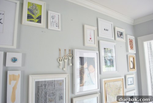 Frame wall in a home with one frame digitally added via Photoshop.