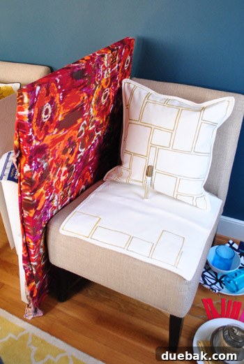 Two pillows in different stages of a DIY drawing project for an 'in progress' and 'after' shot.