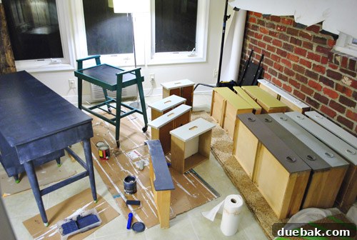 Another view of multiple furniture items being prepped for DIY makeovers.