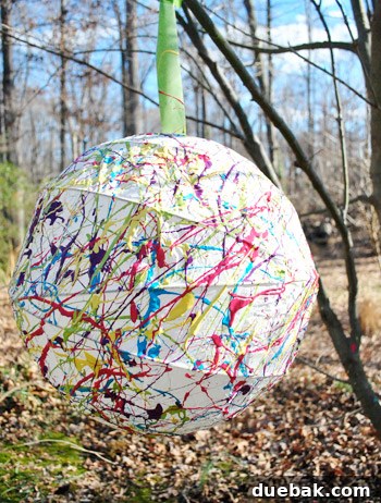 Watercolor paper lantern DIY project after a failed splatter paint attempt.