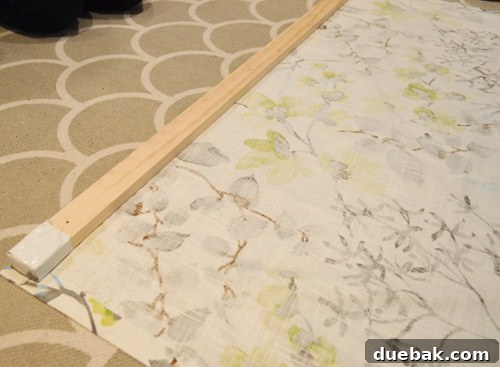 Measuring and cutting a 1x2 inch scrap wood piece for the shade header