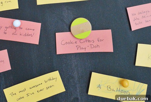 Crafting Your Thanksgiving Gratitude Board 9 Colorful Thanksgiving themed gratitude notes held to magnetic DIY chalkboard