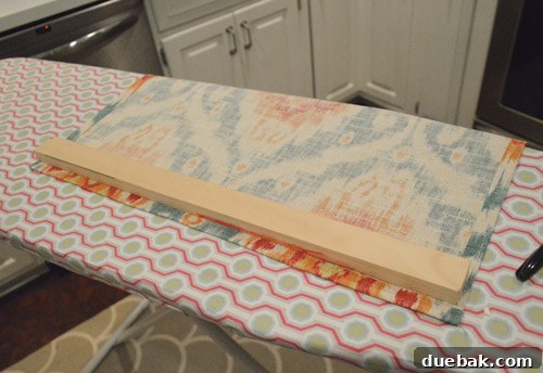 Instant Window Privacy: DIY Shades in Just 15 Minutes 8 small piece of wood atop back side of window shade fabric
