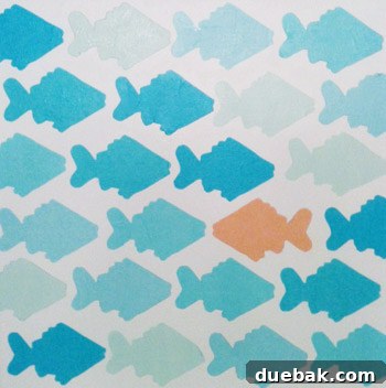 Alise's unique tissue paper fish art project with an orange fish