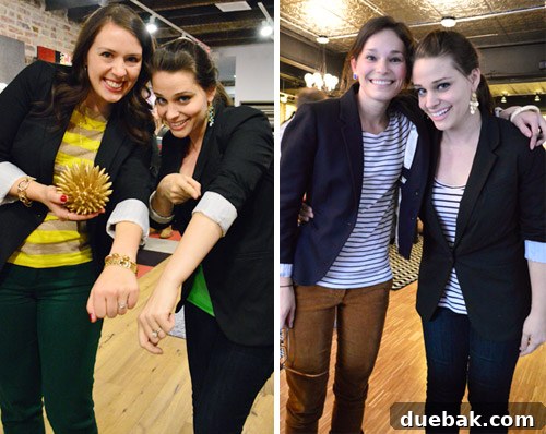 Sherry Petersik posing with fans wearing similar blazers, her 'twins,' at a book signing.