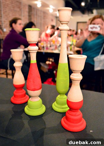 Sherry Petersik's finished striped candlesticks for a holiday centerpiece.