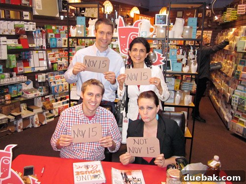 Authors and fans with shared birthdays posing for a fun photo at a book event.