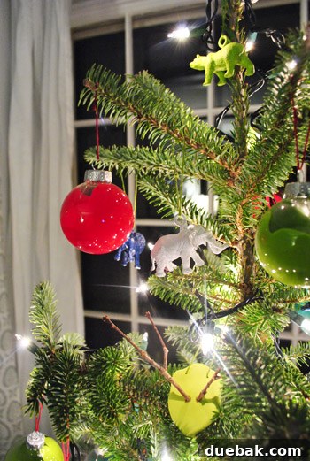 Detail of Hand Painted Christmas Ornaments On Table Top Tree