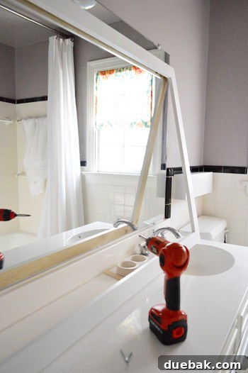 Primed and painted mirror frame drying