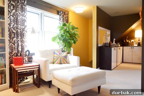 House Transformation: Finally Home 11 Cozy upstairs sitting room and library with deep chocolate walls and bookcases