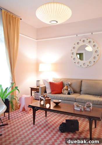 House Transformation: Finally Home 4 Close-up of vintage coffee table and Eames rocker in a stylish living room