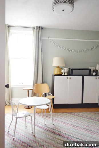 House Transformation: Finally Home 9 Nicole's home office with a toddler table, Dash & Albert rug, and Catbird NYC banner