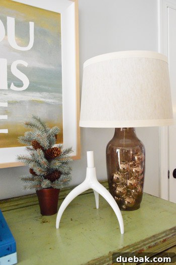 Festive Flair, Simplified 6 Close-up of lamp base filled with silver ornaments