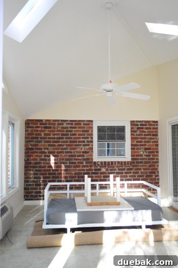 Painting Soaring Vaulted Ceilings: A Master Class 2 Sunroom furniture piled in the center for painting