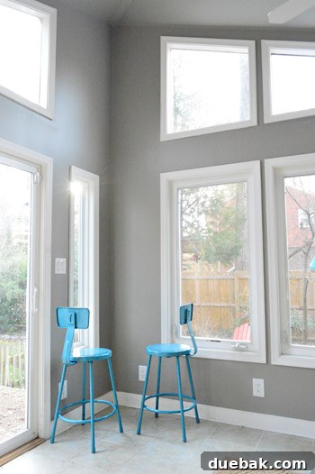 Painting Soaring Vaulted Ceilings: A Master Class 16 Two blue stools in a corner, experimenting with layout
