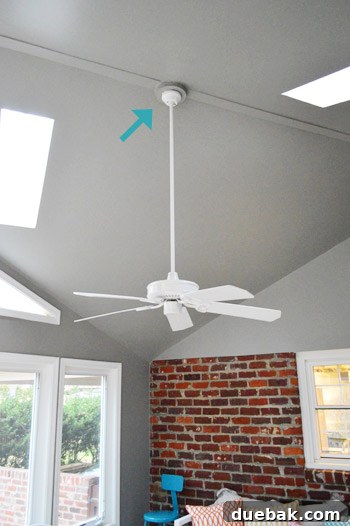 Close-up of the ceiling box where the fan connects, indicating the absence of pre-wired connections for a light