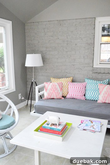 Beautifully painted gray brick wall in the sunroom, showcasing the smooth, unified finish.