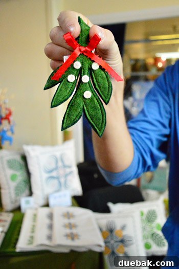 Spade Moderne mistletoe brooch, a versatile holiday accessory or ornament for festive decor