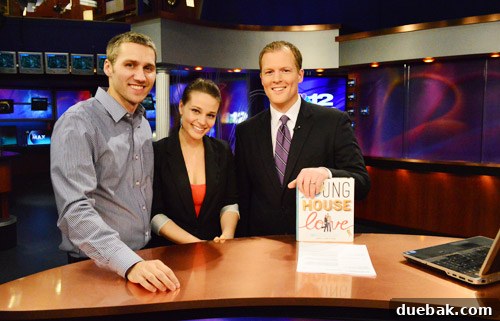 John and Sherry posing with Ryan Nobles on the NBC12 set after their interview.