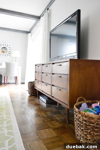 Before restoration: a dingy, scratched mid-century dresser