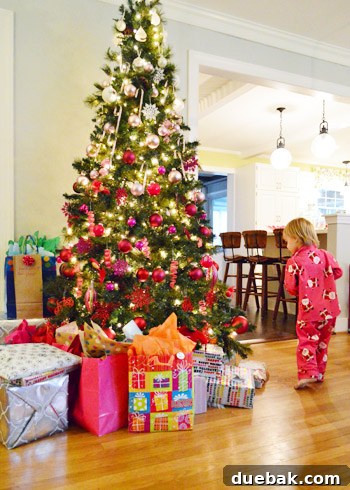 A pile of Christmas presents under the tree, ready to be opened