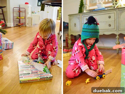 Clara wearing her new winter hat with long braids, which she calls 'pigtails'