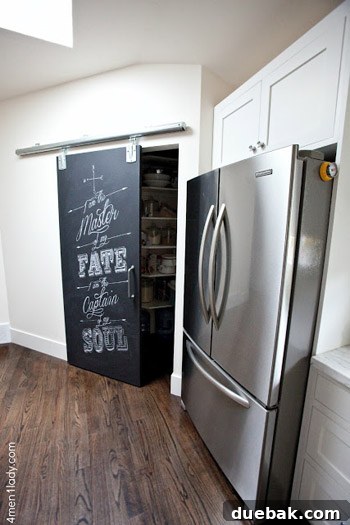 Stylish dining area with modern lighting fixtures, showcasing renovated space