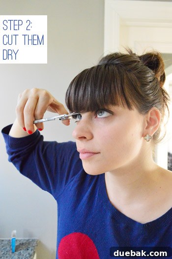 Measuring bangs length against eyelashes for blunt cut