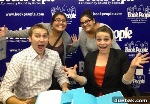 Authors and fans posing for a goofy photo