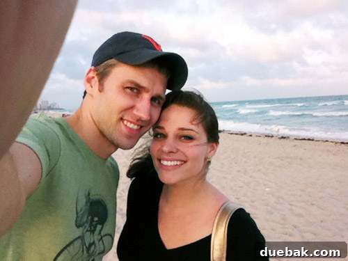 Sherry and John on a Miami beach in casual clothes