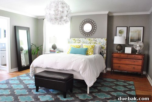 Bedside lamp tucked into a nook, requiring a stretch to reach