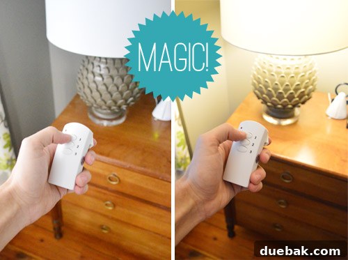 Hand holding a remote control for the bedside lamp