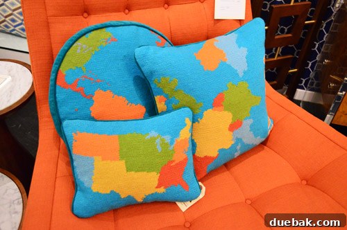 Needlepoint map pillow, an ideal and inspiring piece for designing a vibrant and imaginative child's room.